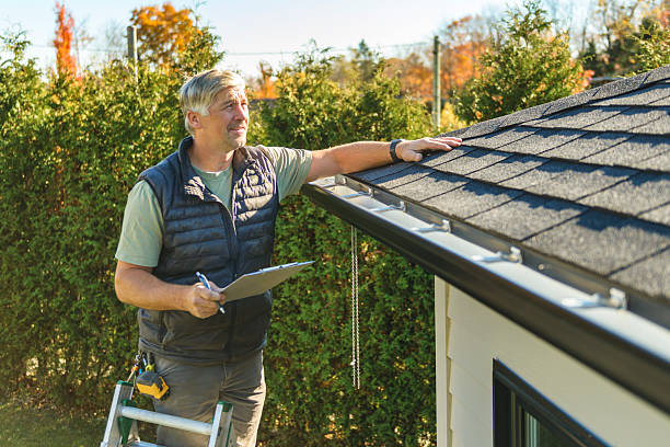 Professional Storm Damage Roof Repair technician working in West Hartland, CT